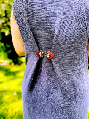 Dress Clip -Myriad Bronze on Dark Red Leather