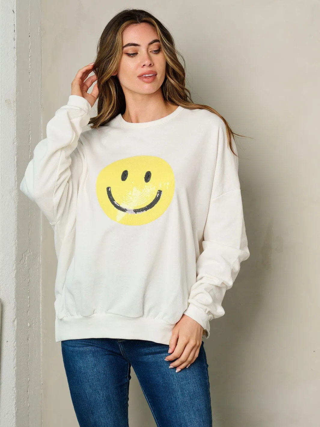 WOMEN'S LONG SLEEVE GRAPHIC SWEATER